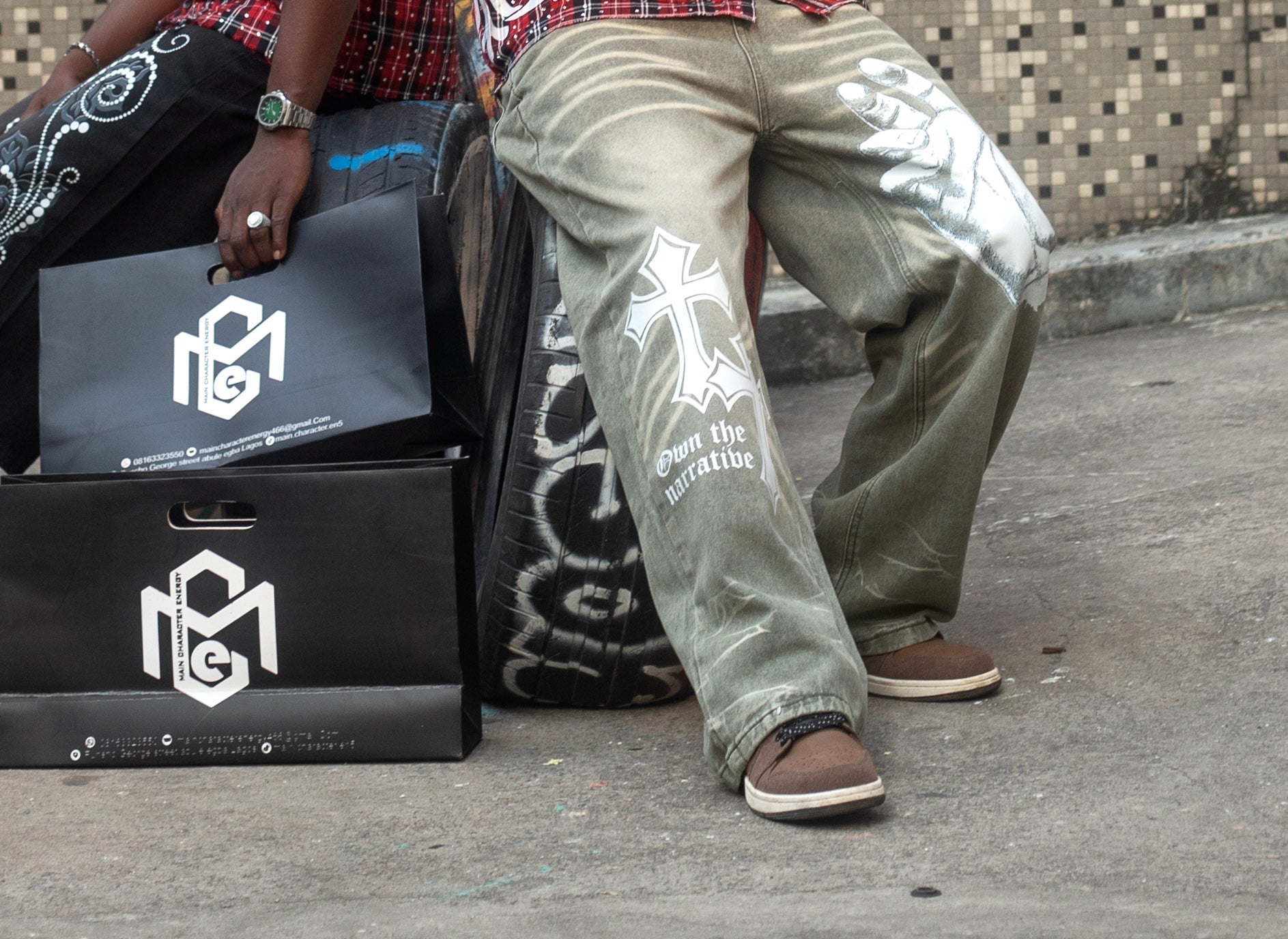 Model wearing OTN Collection trousers by Main Character Energy