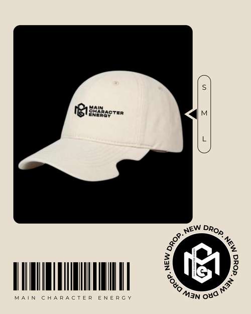 Beige EDGE CUT MAINZ cap featuring structured crown, curved brim, and bold embroidered logo detail on the front, styled in a minimal streetwear aesthetic.